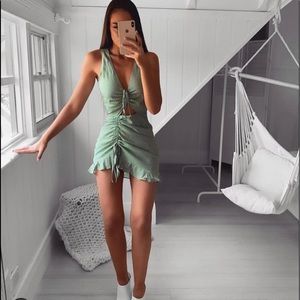 Green and white polka dot dress